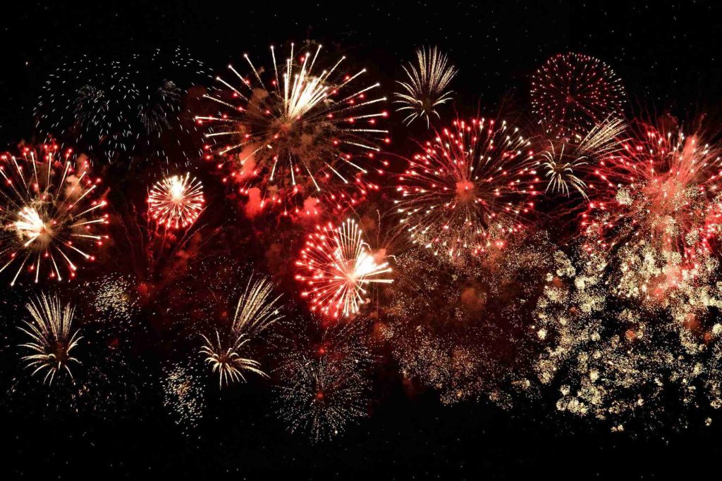 Exploding fireworks creating a sea of sparks